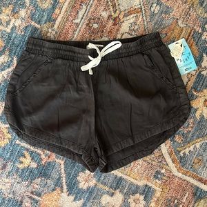 Salt washed Billabong shorts. Never worn, tags still on.